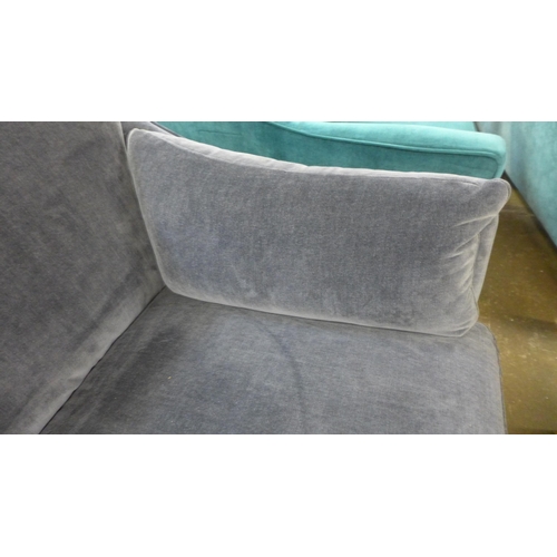 1408 - A blue velvet L shaped sofa - signs or wear