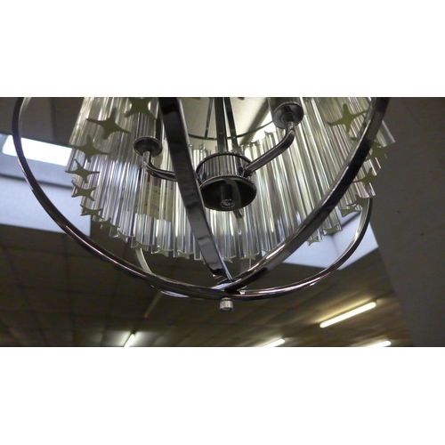 1422 - A chrome orb with crystal rods pendant light