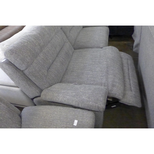 1428 - A grey hopsack reclining three seater sofa