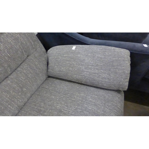 1428 - A grey hopsack reclining three seater sofa