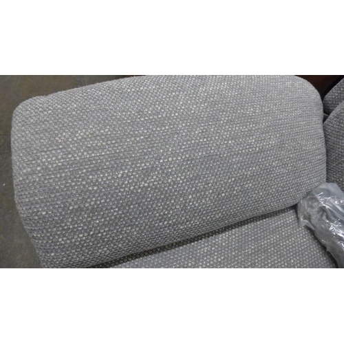 1432 - A grey hopsack reclining three seater sofa - damaged side