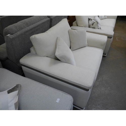 1438 - A cream love seat with steel trim - handling marks