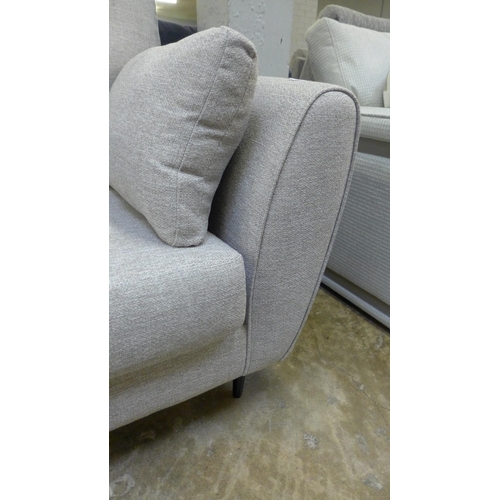 1440 - A mink upholstered three seater sofa