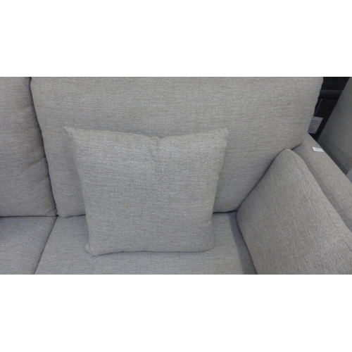 1440 - A mink upholstered three seater sofa