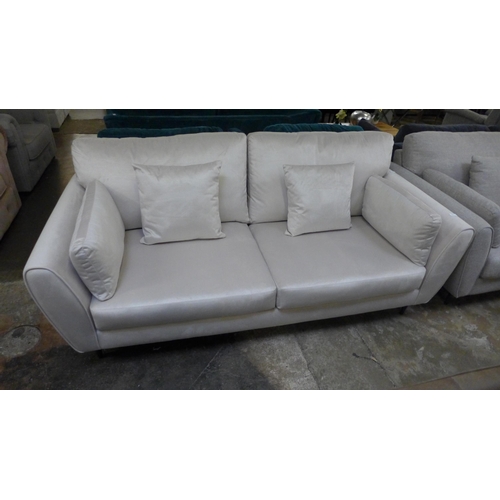 1441 - A mink velvet three seater sofa