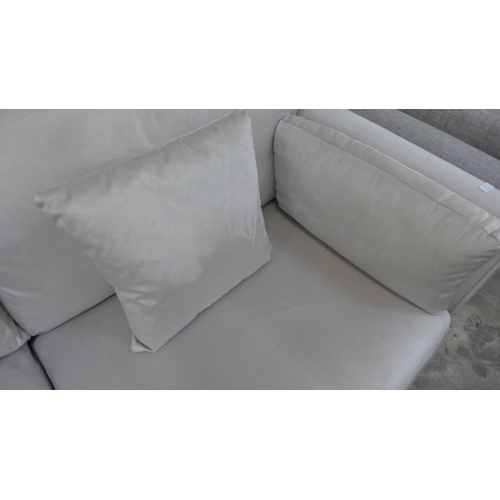 1441 - A mink velvet three seater sofa