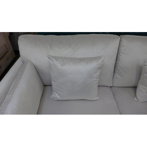 1441 - A mink velvet three seater sofa