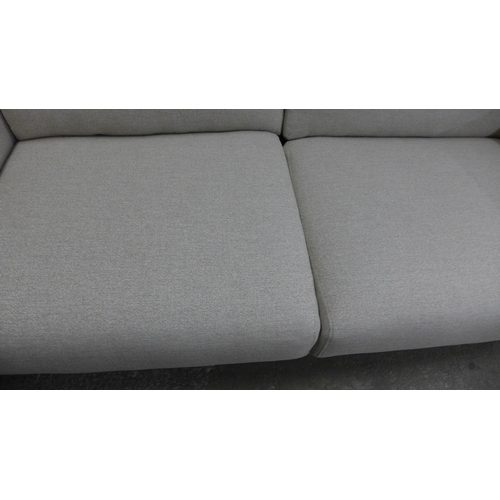 1452 - A sandstone weave four seater sofa