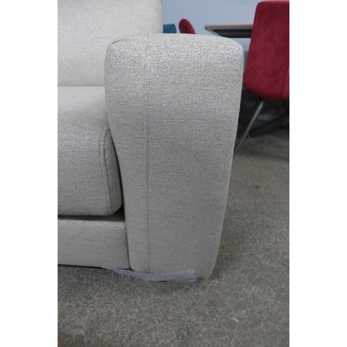 1453 - A sandstone weave three seater sofa