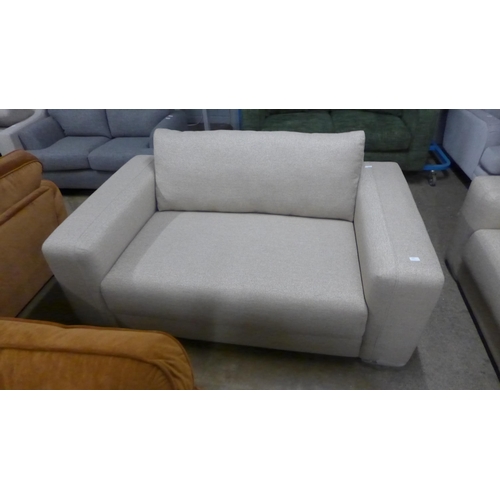 1455 - A sandstone weave two seater sofa