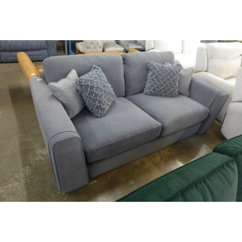 1474 - A steel blue three seater sofa with steel trim