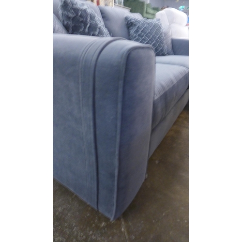 1474 - A steel blue three seater sofa with steel trim