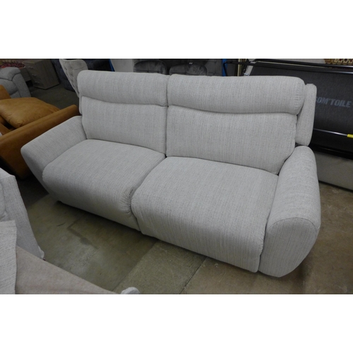 1478 - A light stone three seater reclining sofa