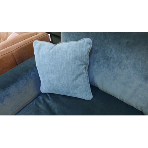 1482 - A turquoise upholstered three seater sofa