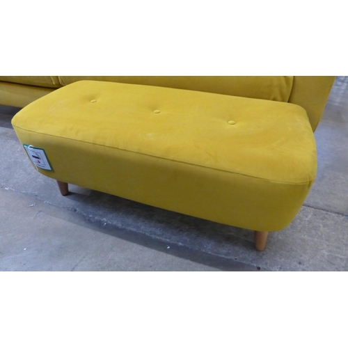 1490 - A turmeric velvet three sater sofa and footstool