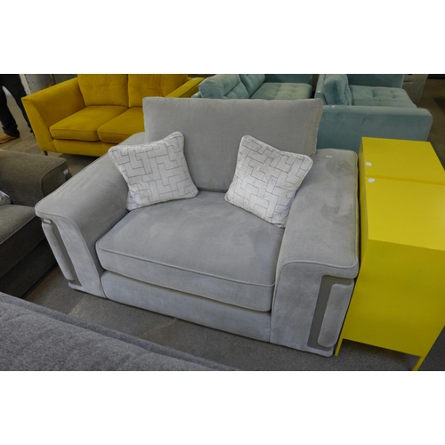 1492 - A grey velvet love seat with steel trim