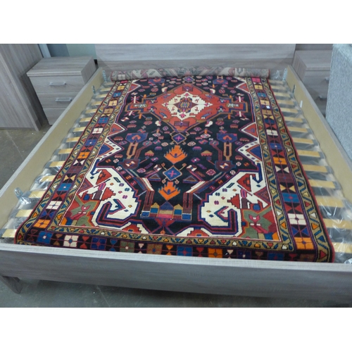 1498 - A hand woven full pile, Persian Nahavan Village rug, rich vibrant colours