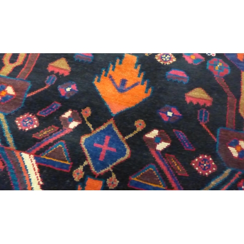 1498 - A hand woven full pile, Persian Nahavan Village rug, rich vibrant colours