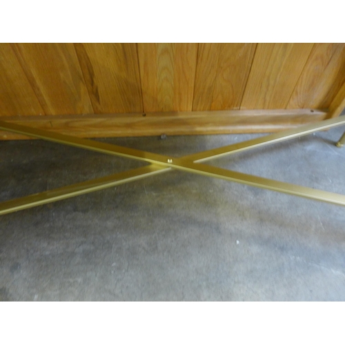 1510 - A black geometric console table with gold legs