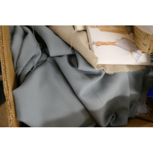 2401 - A dressmaking dummy and a large quantity of patterns