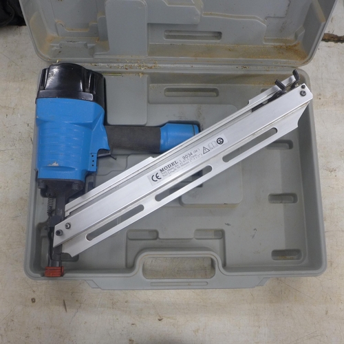 2063 - A pneumatic nail gun, model 9034, max nail diameter 1/8