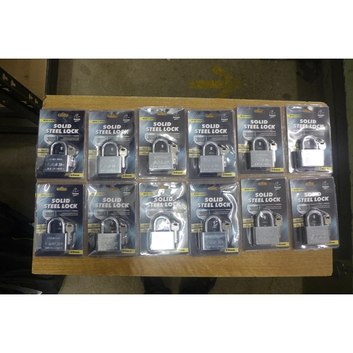 2101 - A box of 12 solid steel locks - including keys