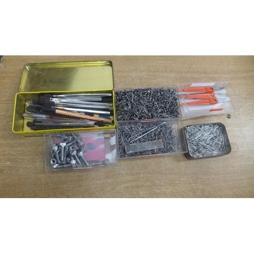 2133 - A box of panel pins of assorted sizes