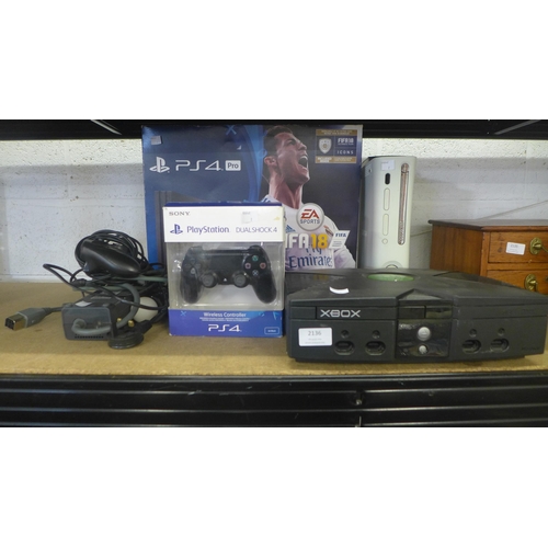 2136 - A Playstation 4 Pro 1TB console with original box, boxed and unused Playstation 4 Dualshock 4 wirele... 