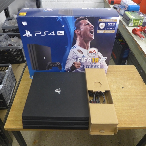 2136 - A Playstation 4 Pro 1TB console with original box, boxed and unused Playstation 4 Dualshock 4 wirele... 