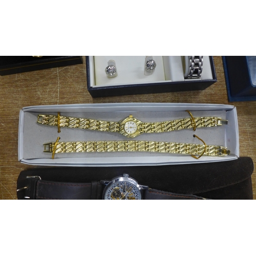 2154 - 5 Boxed watches including a gent's Skeleton watch