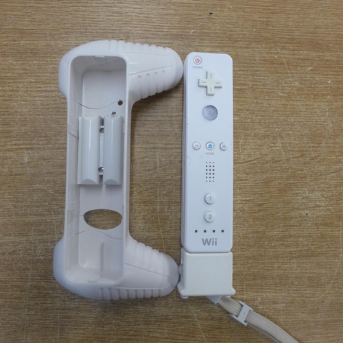 2155 - A Wii console and cables including Boogie Superstar games and an assortment of controllers