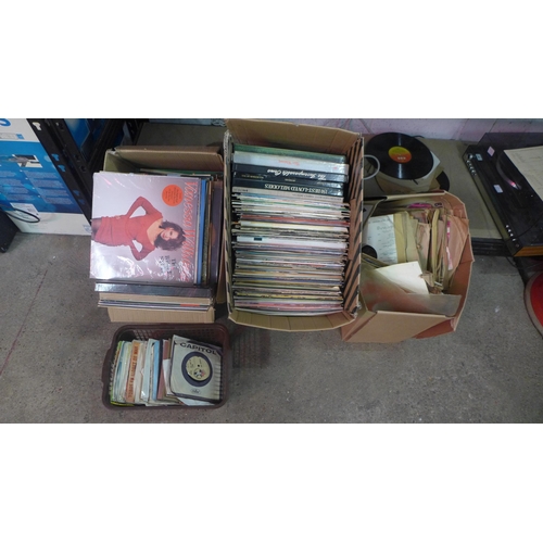 2165 - Three boxes containing a large quantity of vinyl LP records and 7