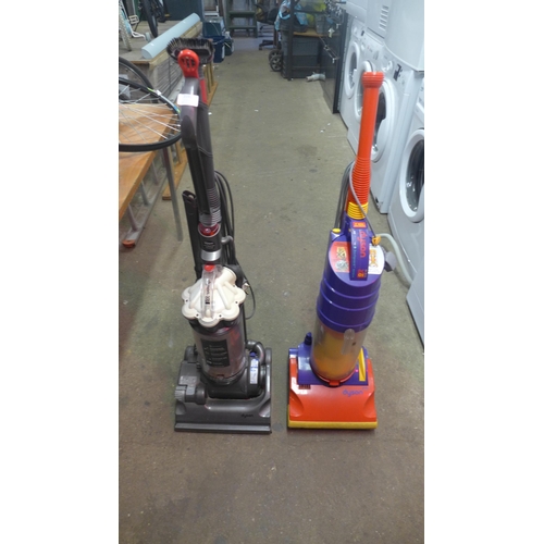 2191 - 2 Dyson upright vacuum cleaners - DC33 and DC01