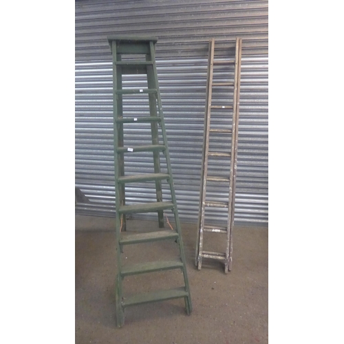 2206 - A set of 10-rung wooden stepladders and a set of 9-rung wooden extension ladders