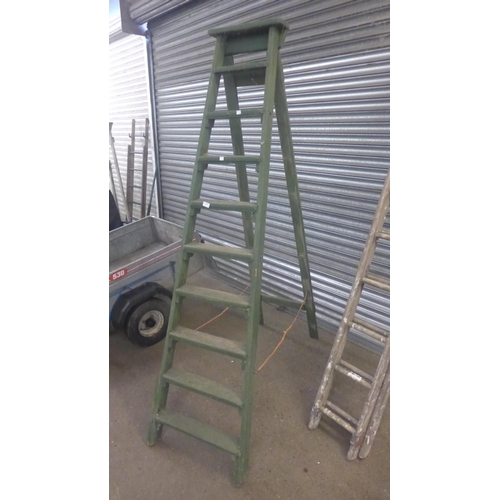 2206 - A set of 10-rung wooden stepladders and a set of 9-rung wooden extension ladders