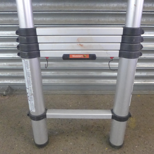 2207 - A set of Telesteps telescopic extending ladders