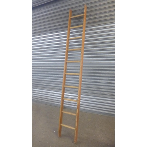 2210 - A single 15 rung metal ladder and a wooden ladder