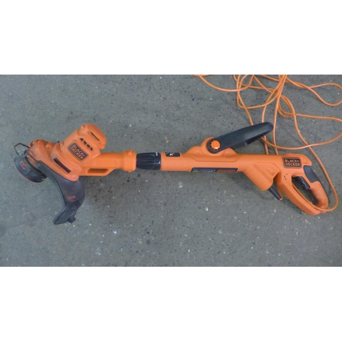 2232 - An electric Black & Decker strimmer and an electric Sovereign hedge cutter