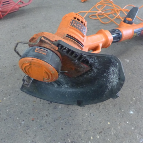 2232 - An electric Black & Decker strimmer and an electric Sovereign hedge cutter