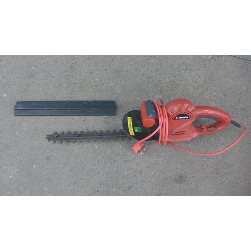 2232 - An electric Black & Decker strimmer and an electric Sovereign hedge cutter