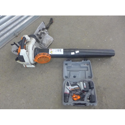 2242 - A Stihl SH86 CE shredder/vacuum blower and a Performance Power PDD144A power drill with battery and ... 