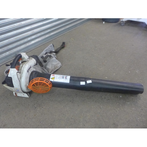 2242 - A Stihl SH86 CE shredder/vacuum blower and a Performance Power PDD144A power drill with battery and ... 