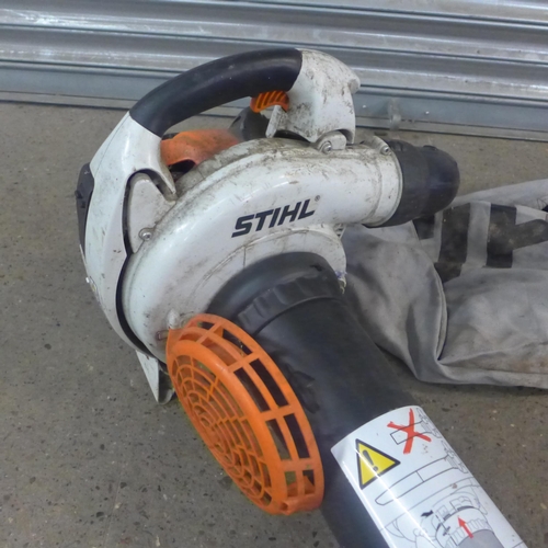 2242 - A Stihl SH86 CE shredder/vacuum blower and a Performance Power PDD144A power drill with battery and ... 