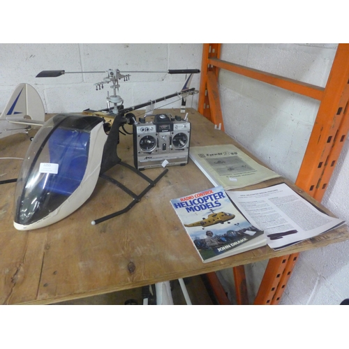 2255 - A remote controlled JRPROPO Apex helicopter with controller