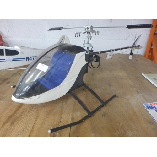 2255 - A remote controlled JRPROPO Apex helicopter with controller