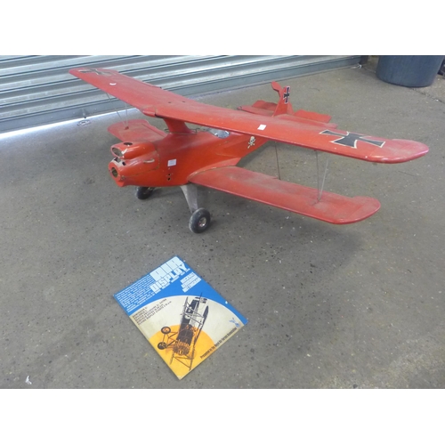 2257 - A 1960s scratch built Red Baron bi-plane exhibited at Hucknall Aerodrome with original advertising d... 