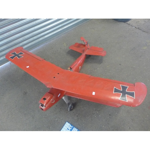 2257 - A 1960s scratch built Red Baron bi-plane exhibited at Hucknall Aerodrome with original advertising d... 