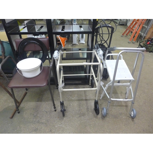 2258 - A quantity of disability and mobility equipment including walkers, frames, chairs, etc.