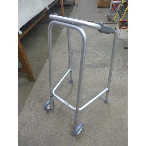 2258 - A quantity of disability and mobility equipment including walkers, frames, chairs, etc.