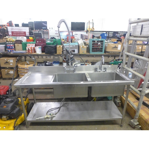 2261 - A stainless steel double sink with hose tap